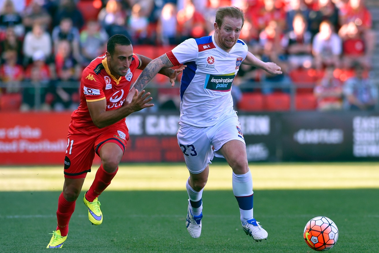Adelaide and Newcastle really have played twice this season. AAP Image/David Mariuz