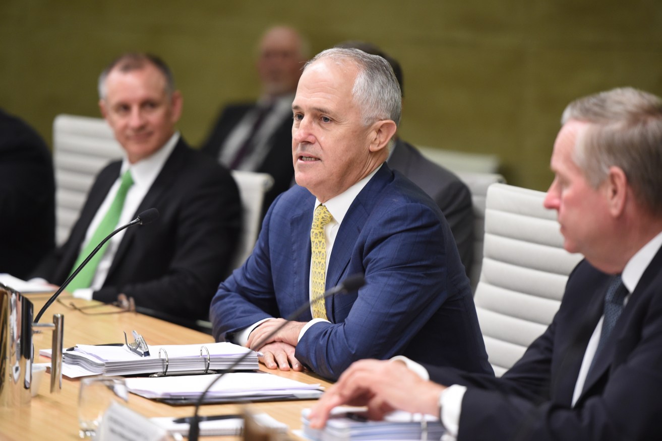 Malcolm Turnbull is flanked by Jay Weatherill and Western Australian Premier Colin Barnett at today's meeting. Photo: Dean Lewins / AAP