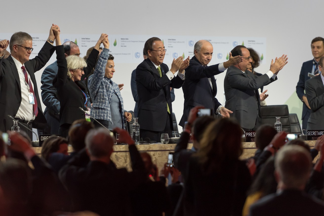 World leaders celebrate reaching agreement in Paris. AAP Image/NEWZULU/JONATHAN  RAA
