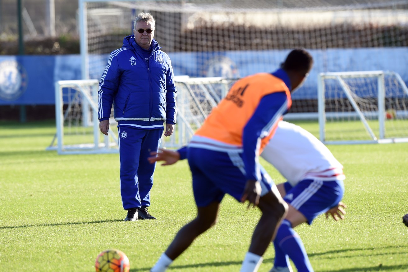 Guus Hiddink oversees yesterday's Chelsea training session. Associated Press photo.