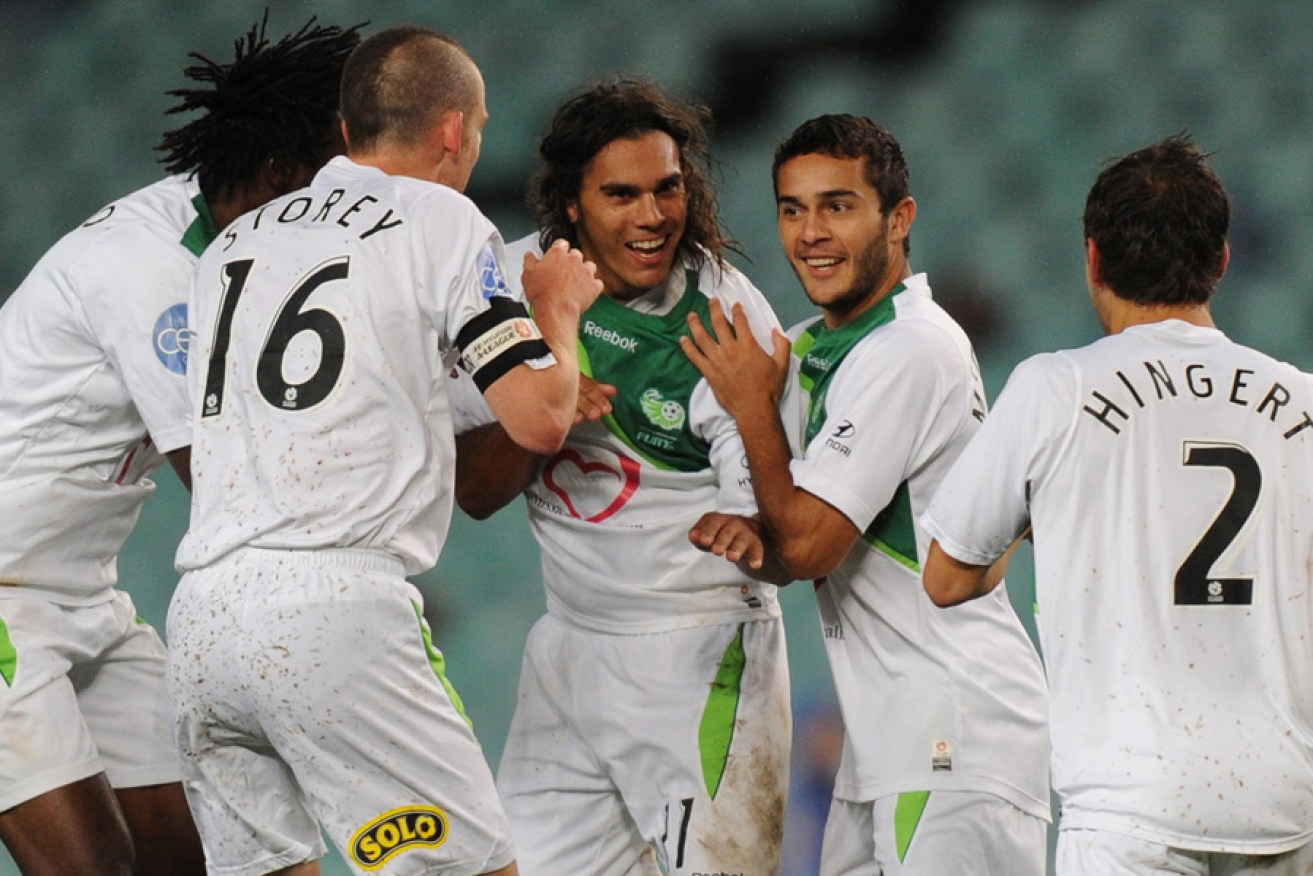 North Queensland Fury players celebrate a goal during their brief A-League tenure.