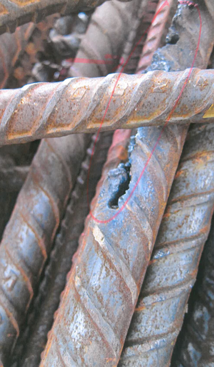 This photograph, marked with highlighter pen, shows steel reinforcement heated using oxy acetylene, former Superway workers say.