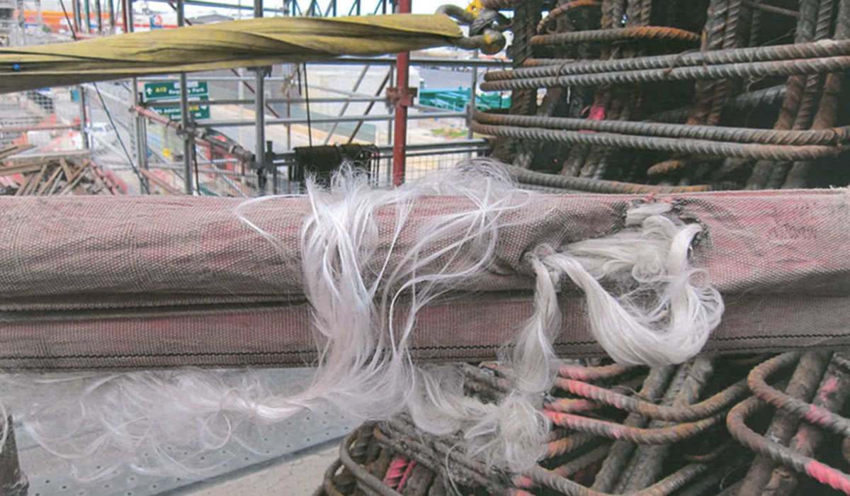 Former Superway workers say this photographs shows a frayed soft sling in use on the project.