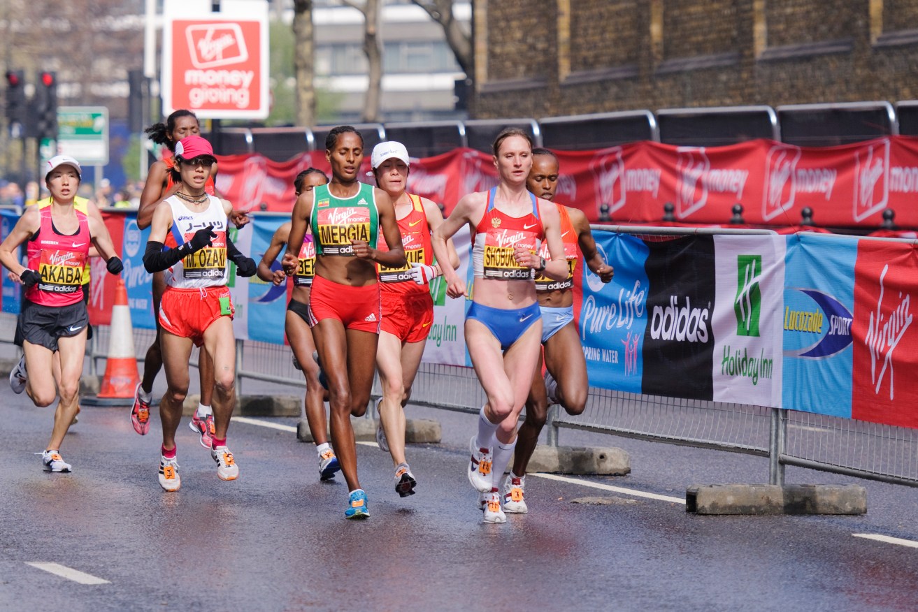 Disgraced Russian Liliya Shobukhova leads the pack during the 2010 London Marathon. The IAAF has today banned several officials relating to bribes paid to cover up her doping. Photo: STEPHEN CHUNG / NEWZULU / AAP.