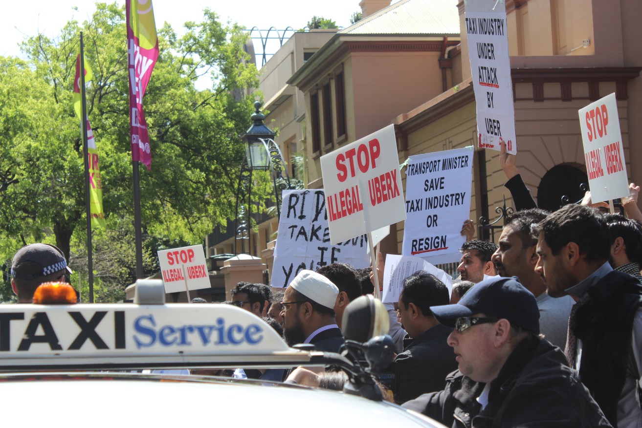 Taxi drivers rally against Uber in NSW. Photo: PETER BOYLE/NEWZULU/AAP.