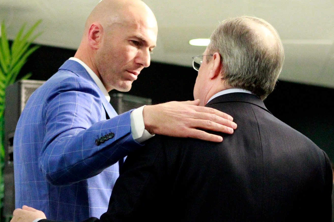 Real Madrid's President Florentino Perez embraces Zinedine Zidane. Photo: VICTOR LERENA, EPA