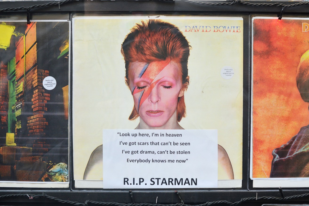 David Bowie albums in the window of Sister Ray Records in Soho. The rock star has died following an 18-month battle with cancer. Photo: Dominic Lipinski, PA Wire