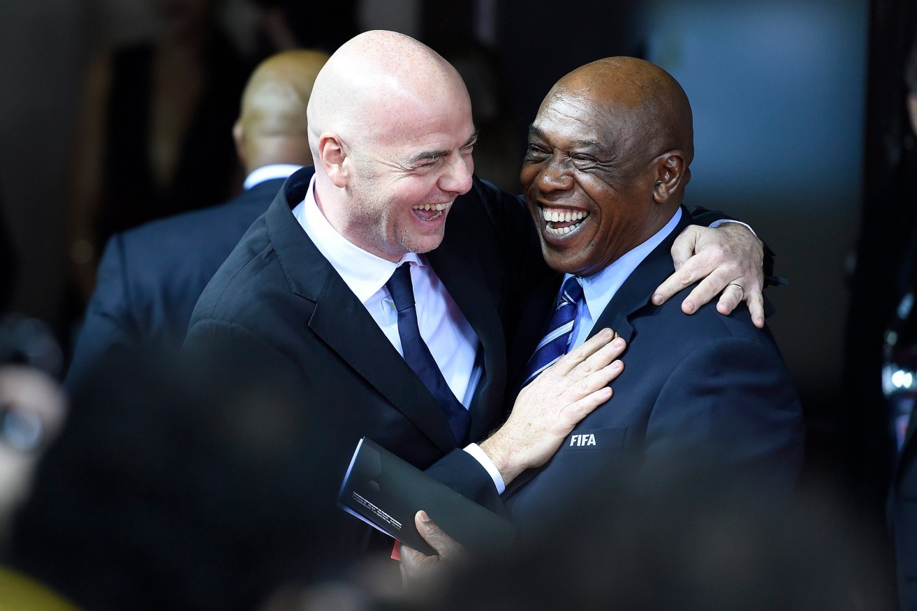 UEFA General Secretary Gianni Infantino with FIFA presidential candidate Tokyo Sexwale at this month's Ballon d'Or ceremony. Photo: VALERIANO DI DOMENICO, EPA.