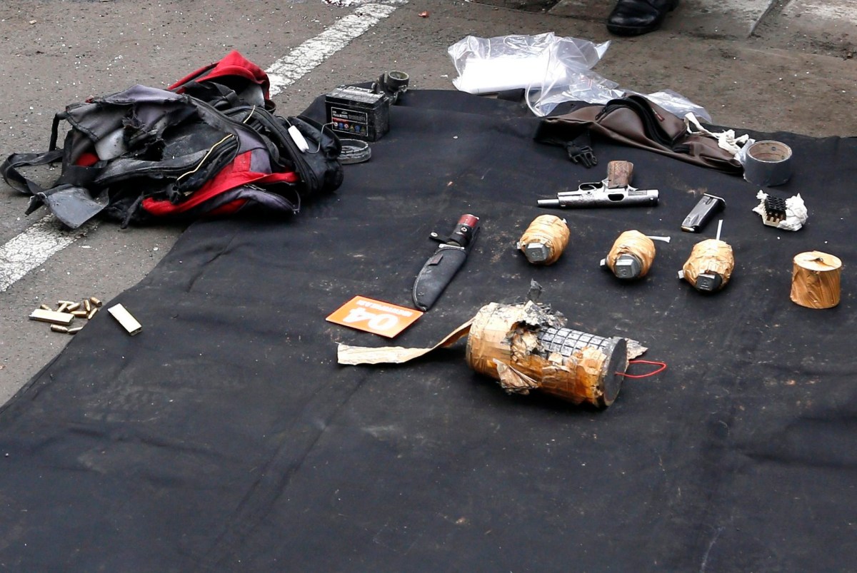 The weapons arsenal suspected terrorists were carrying after a bomb blast in front of a shopping mall in Jakarta yesterday. Photo: EPA