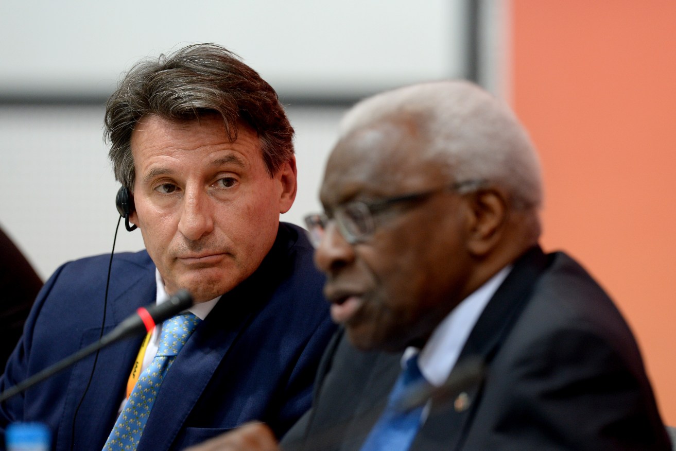 IAAF president Sebastien Coe watches his predecessor Lamine Diack. Photo: Martin Rickett, PA Wire.