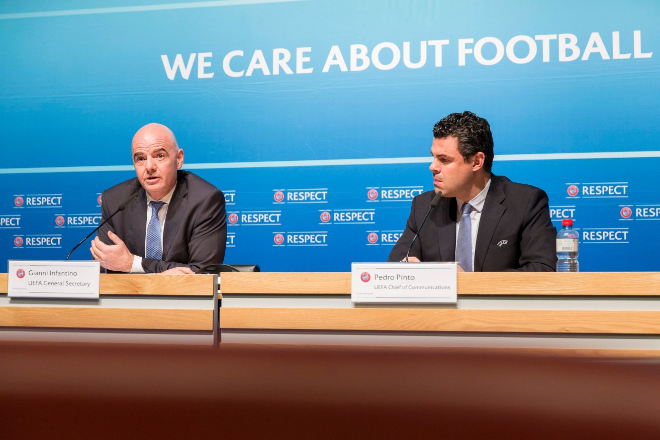 WE CARE A LOT: UEFA General Secretary and FIFA presidential candidate Gianni Infantino (left, with Pedro Pinto, UEFA's chief of communications) was one of four aspirants who snubbed the debate. Photo: CYRIL ZINGARO, EPA.