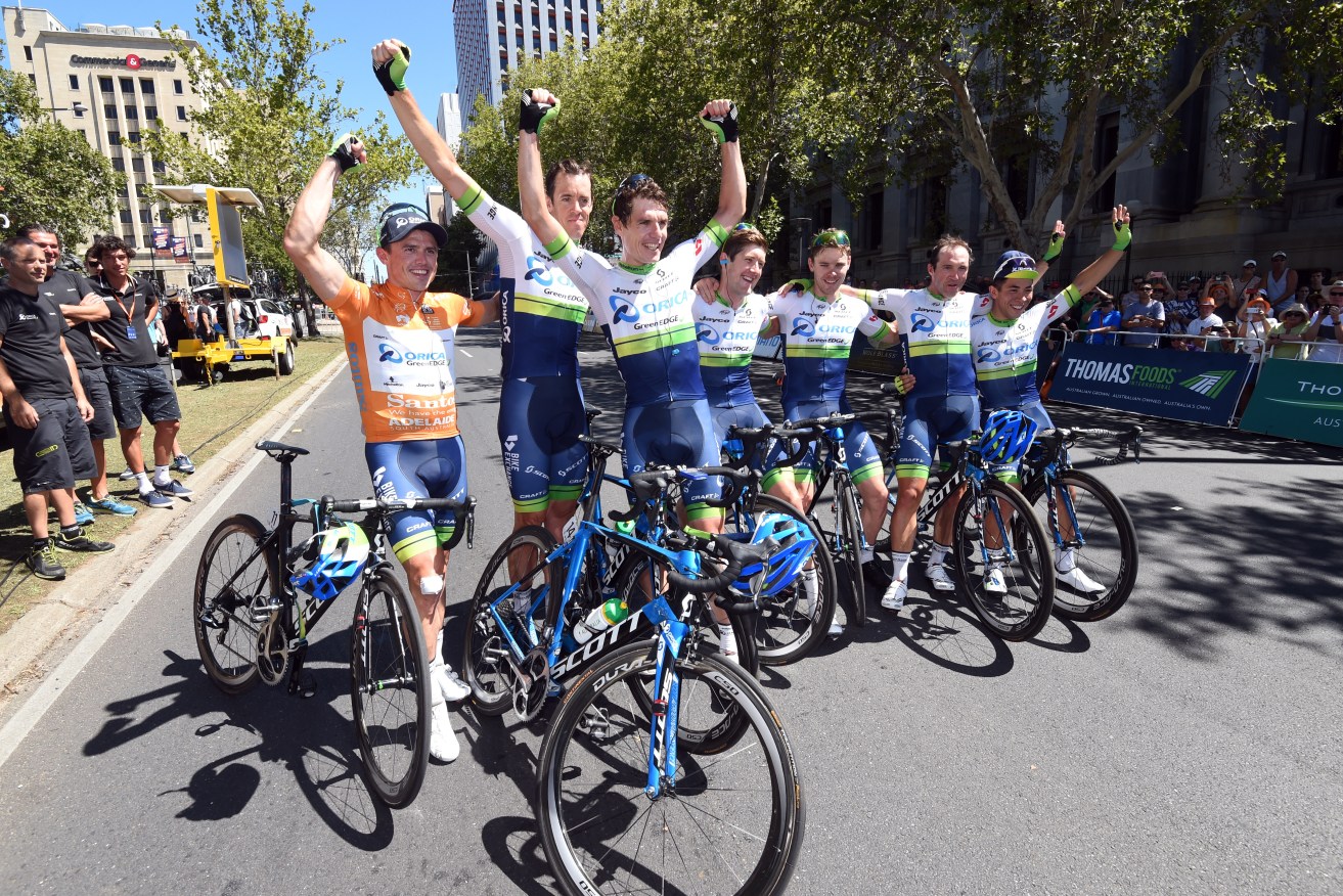 Simon Gerrans (left) with his Orica-GreenEdge teammates after winning stage six of the Tour Down Under in Adelaide. AAP Image/Dan Peled