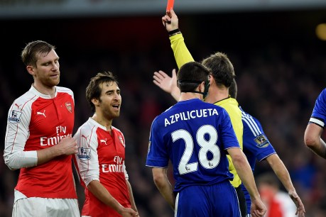 10-man Gunners downed by Chelsea