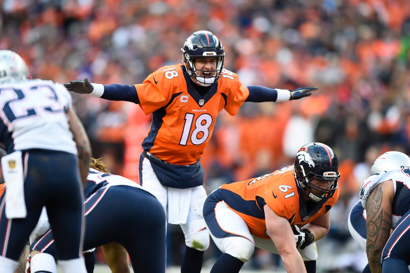 Denver Broncos quarterback Peyton Manning changes the play against the New England Patriots. Photo: EPA/LARRY W. SMITH