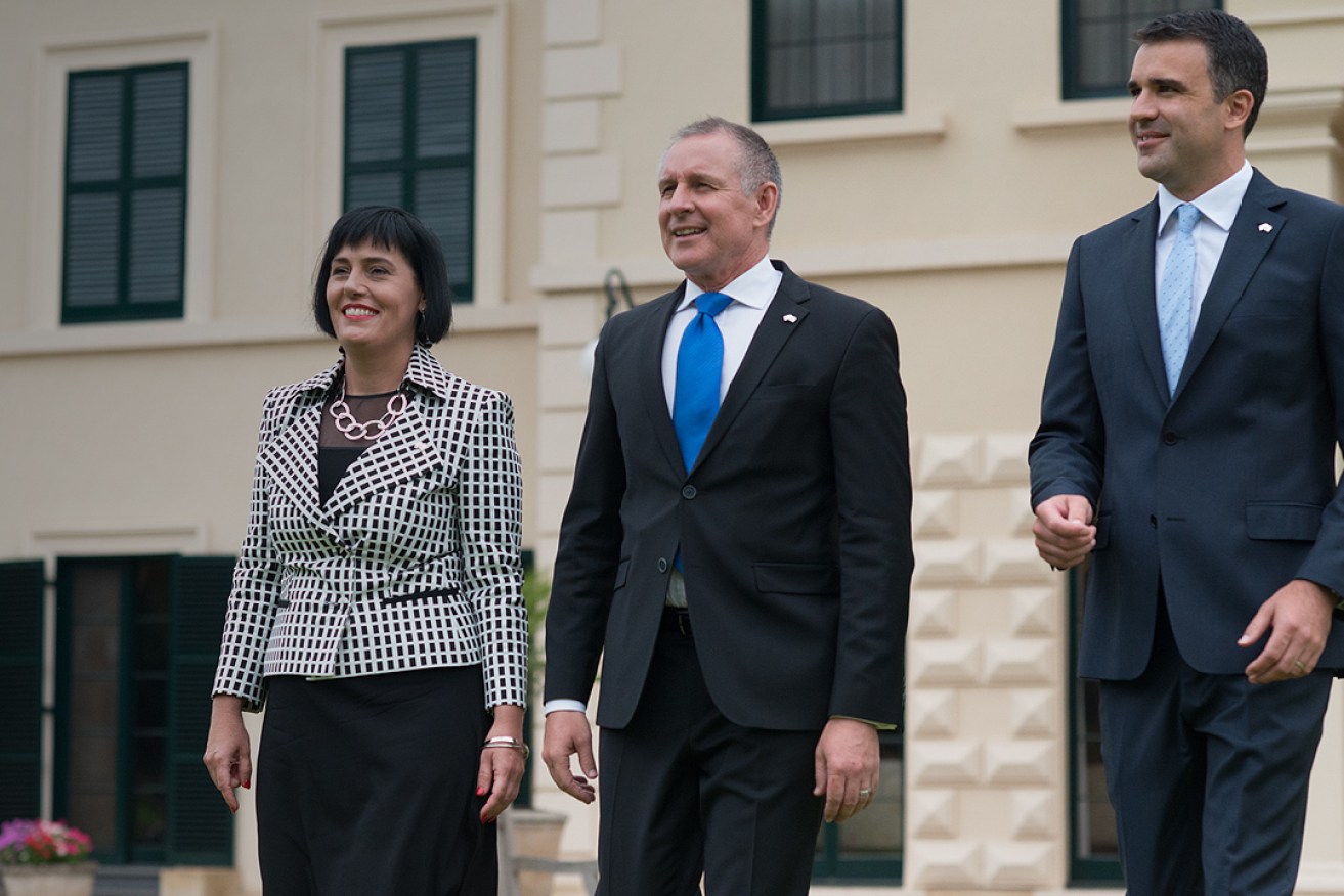 Premier Jay Weatherill (centre) at Government House today with new ministers Leesa Vlahos and Peter Malinauskas. Photo: Nat Rogers/InDaily