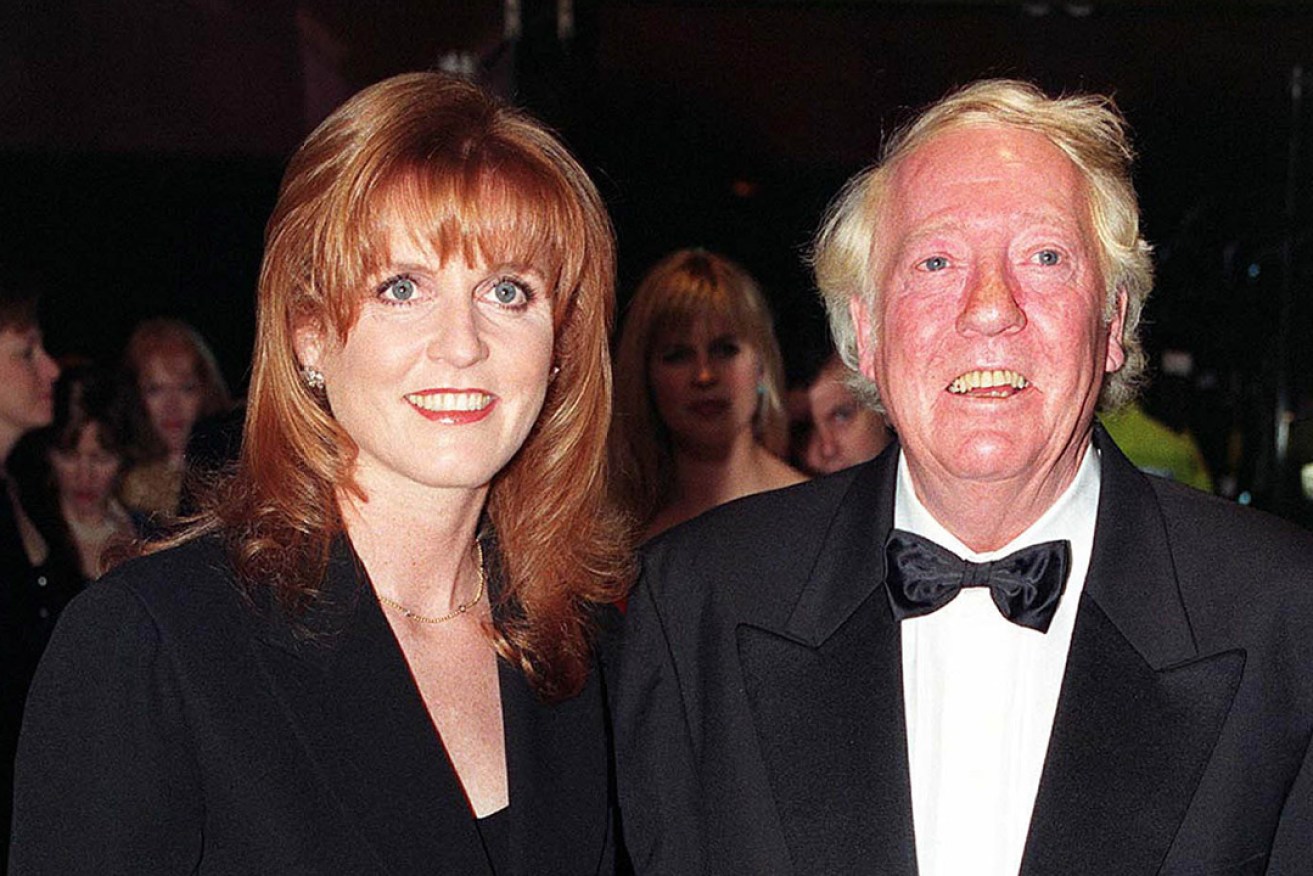 Robert Stigwood with the Duchess of York, arriving for the premiere of the film Evita in 1996.