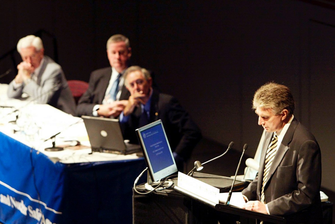 John Hill (right) in 2004, speaking at a public forum on the consequences of a proposed nuclear waste dump in outback South Australia. Photo: AAP Image/Rob Hutchison