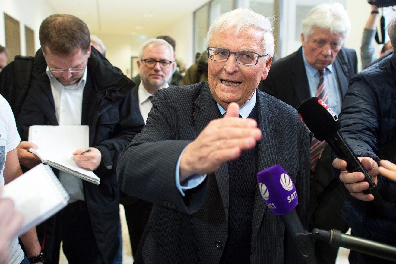 Theo Zwanziger, former president of the German Football Association (DFB), talks to journalists at the regional court in Dusseldorf. Photo: FEDERICO GAMBARINI, EPA.