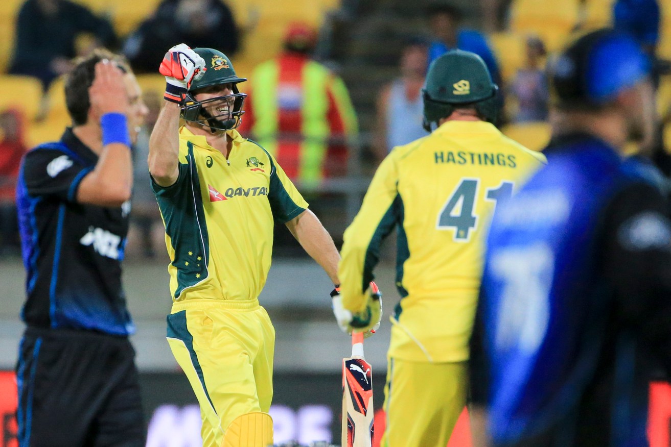 Mitchell Marsh and John Hastings celebrate clinching the second ODI against New Zealand on Saturday. Photo: John Cowpland, AAP/SNPA.