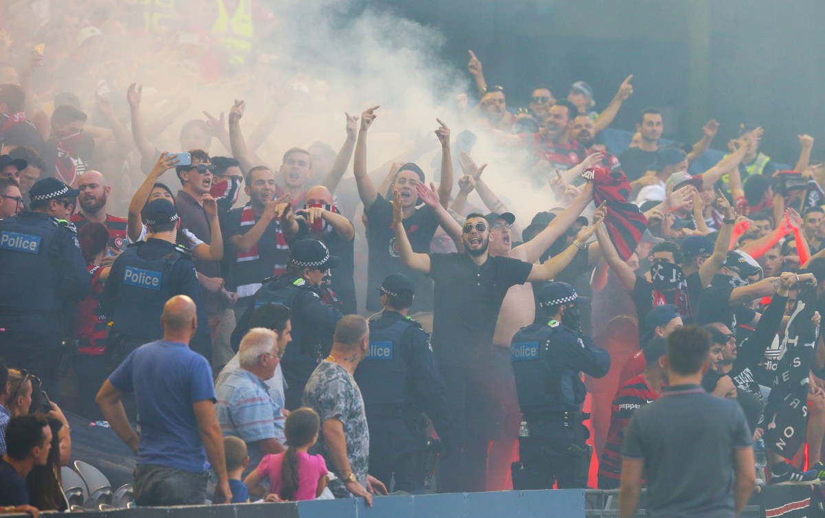Wanderer fans let off flares during the round 18 A-League match. Photo: David Crosling, AAP.