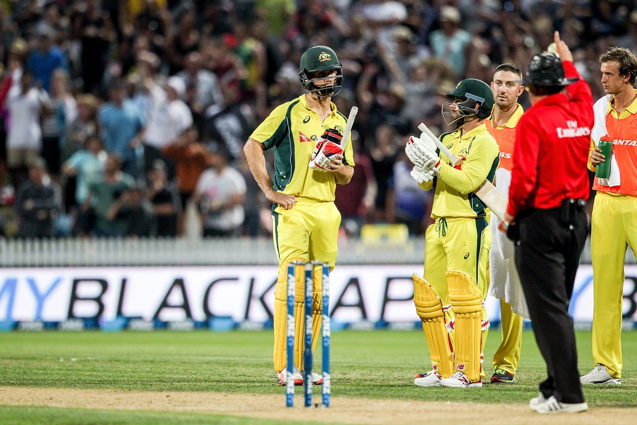Mitchell Marsh reacts after being given out during yesterday's match. Photo: Martin Hunter, AAP/SNPA.