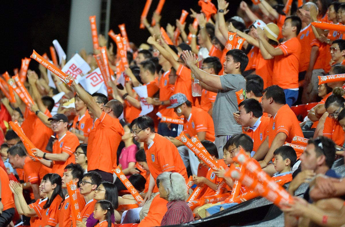 Shandong Luneng fans during the AFC Champions League playoff match between the Adelaide United and Shandong Luneng FC at Coopers Stadium in Adelaide, on Tuesday, Feb. 9, 2016. (AAP Image/David Mariuz) NO ARCHIVING, EDITORIAL USE ONLY