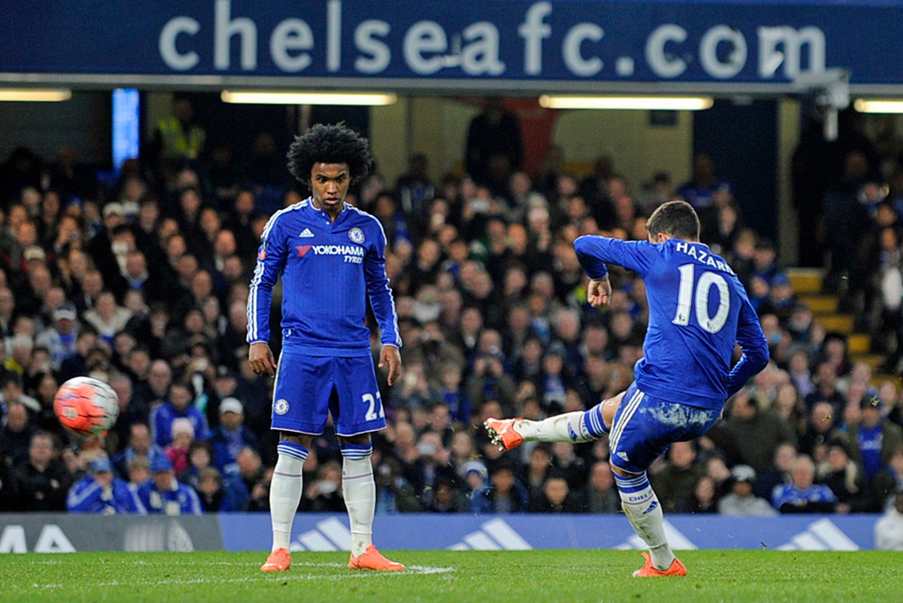Chelsea's Eden Hazard scores their fourth goal against Manchester City. Photo: GERRY PENNY, EPA. 