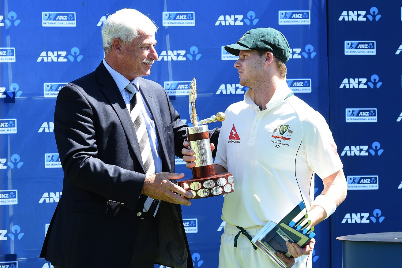 Sir Richard Hadley presents Steve Smith with the Trans-Tasman Trophy. Photo: Dave Hunt, AAP.