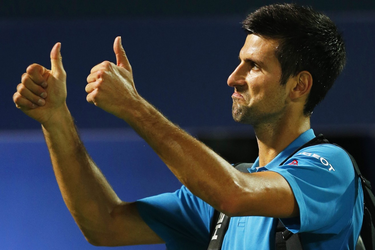 Djokovic gestures after withdrawing from his quarter final match against Feliciano Lopez. Photo: ALI HAIDER, EPA.