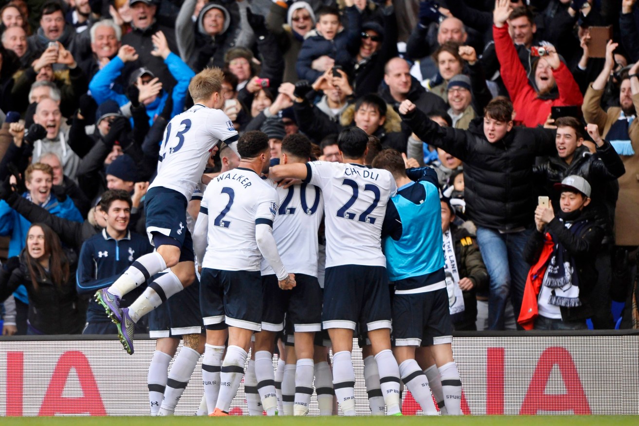Tottenham Hotspur players celebrate their winning goal against Swansea City. Photo: EPA/Hannah McKay
