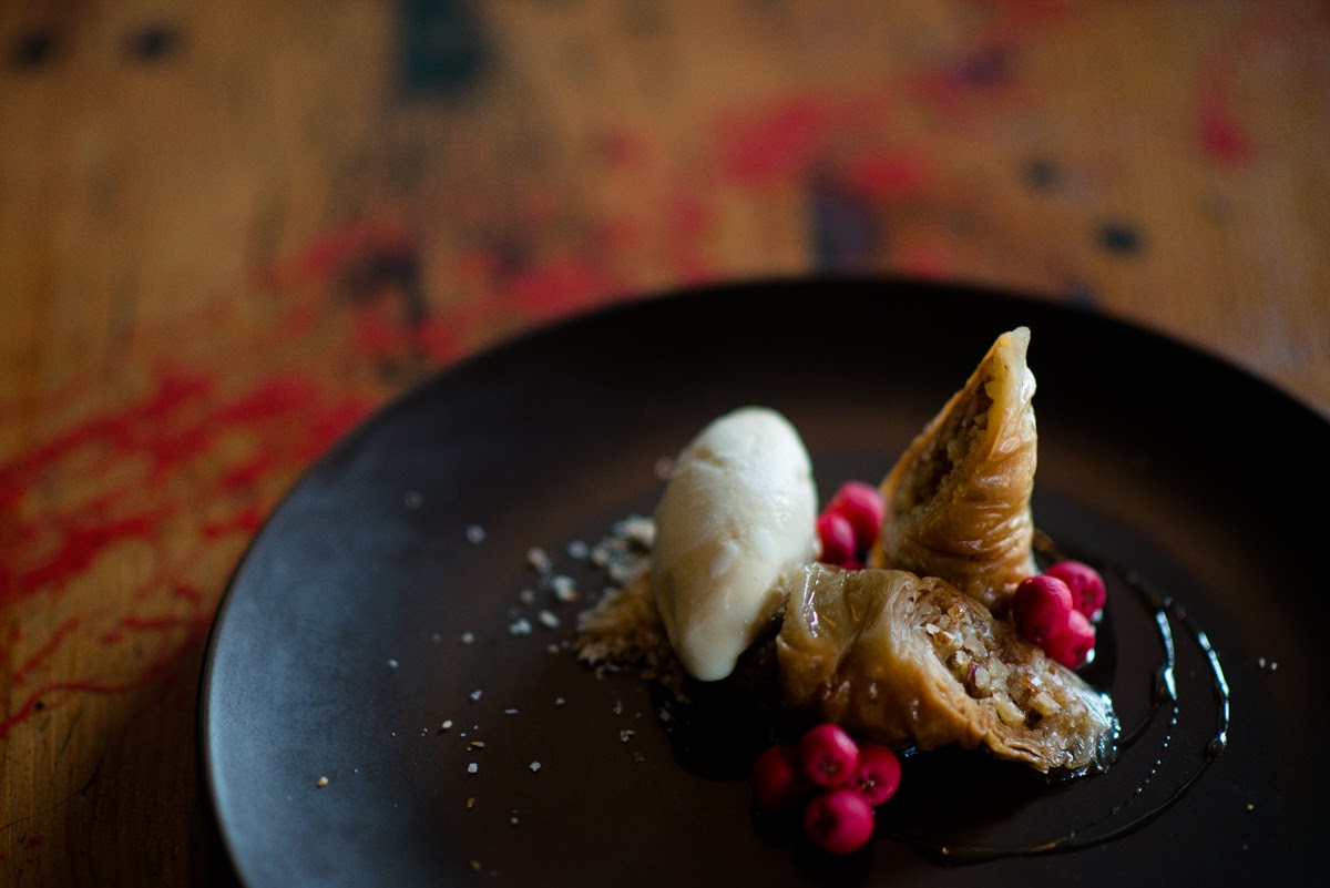 Syrian Antiakiyyeh pastries with fresh riberries and honey ice cream. Photo: Nat Rogers/InDaily