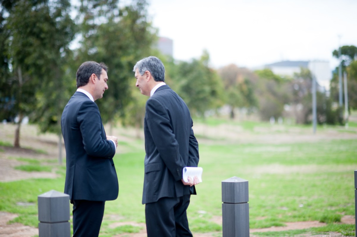 Steven Marshall has a quiet word with Rob Lucas during the 2014 state election campaign.