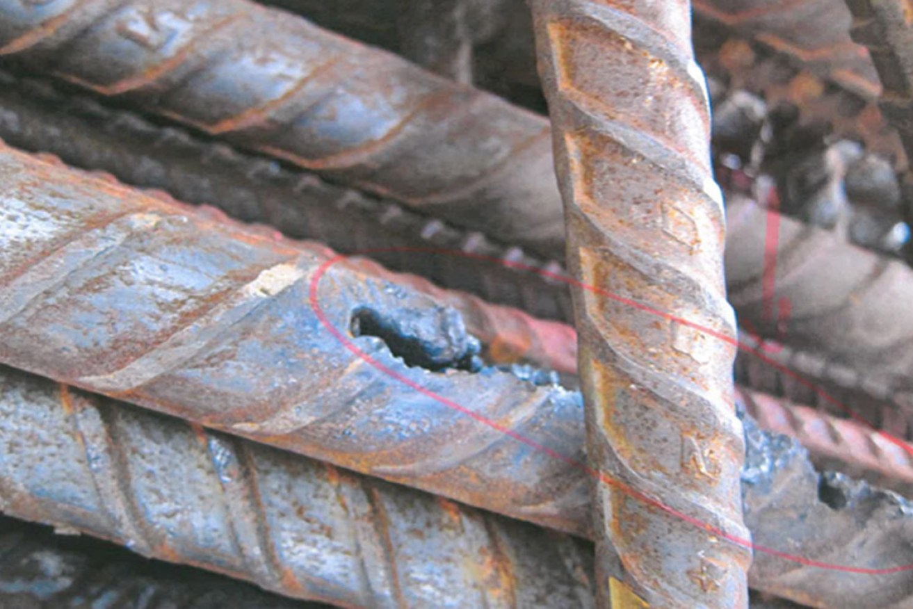 The transport department claims damaged steel reinforcement was replaced before concrete was poured onto it, but workers from the site tell a different story.