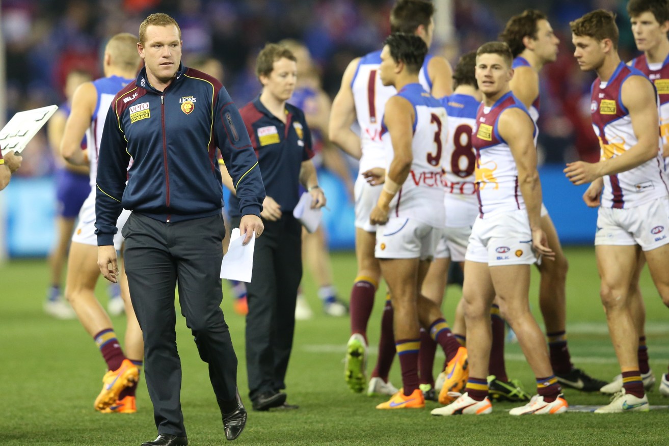 Not walking away: Lions coach Justin Leppitschhas signed a contract extension. Photo: David Crosling, AAP.