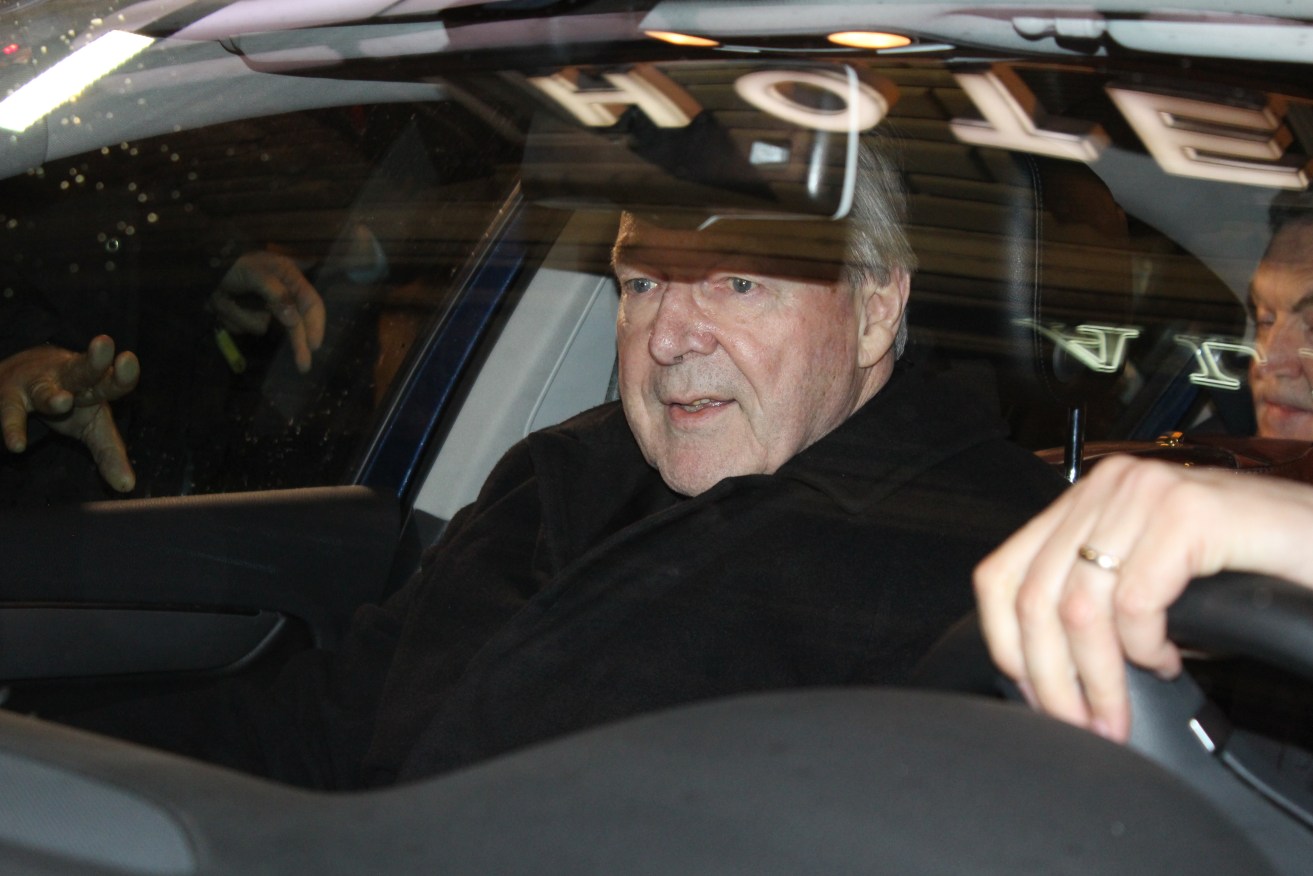 Cardinal George Pell in a car outside the Quirinale Hotel in Rome where he has been giving evidence to the child abuse royal commission by video-link. Photo: AAP/Lloyd Jones