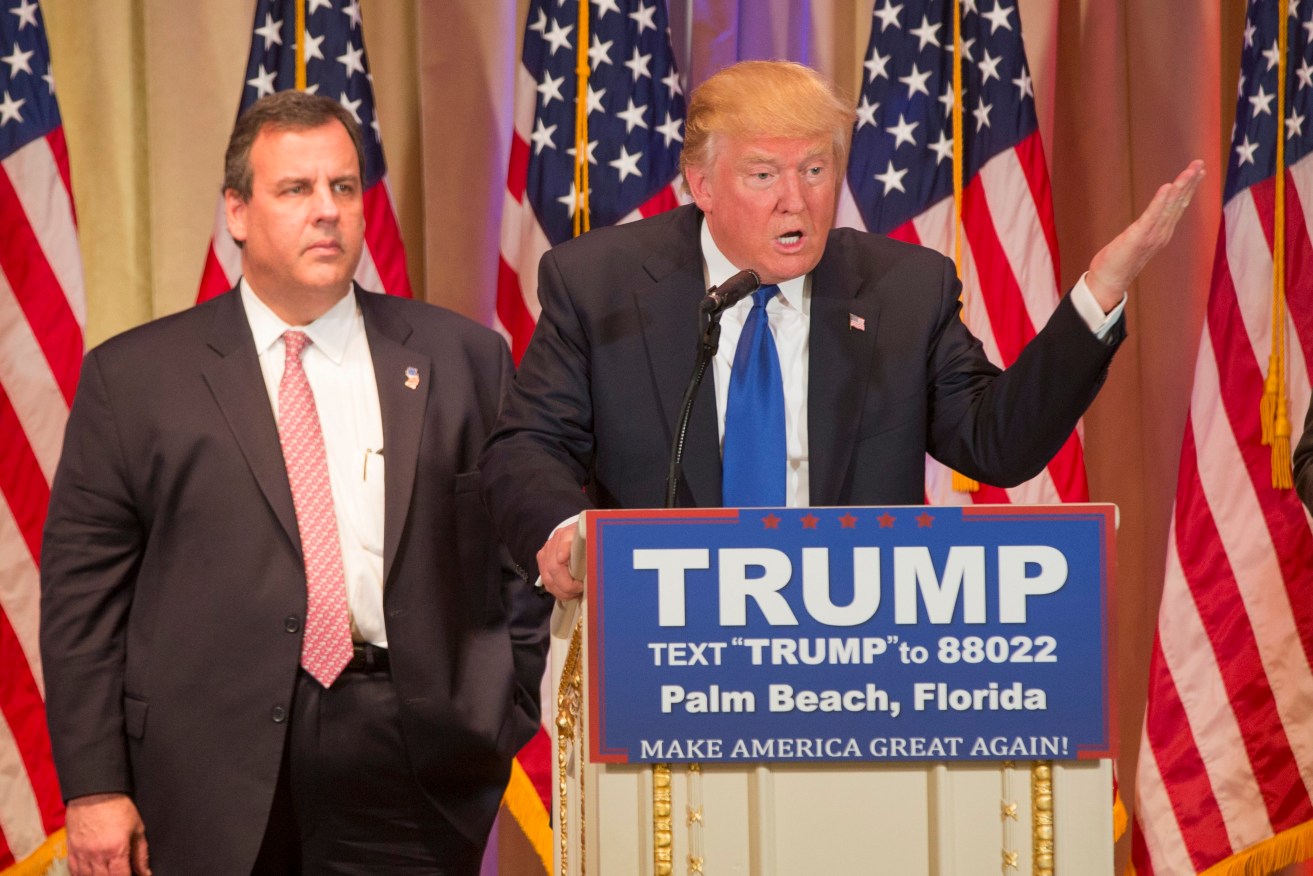 Donald Trump speaks at a Super Tuesday event in Florida after being introduced by  New Jersey Governor Chris Christie (left). Photo: EPA/Ryan Stone