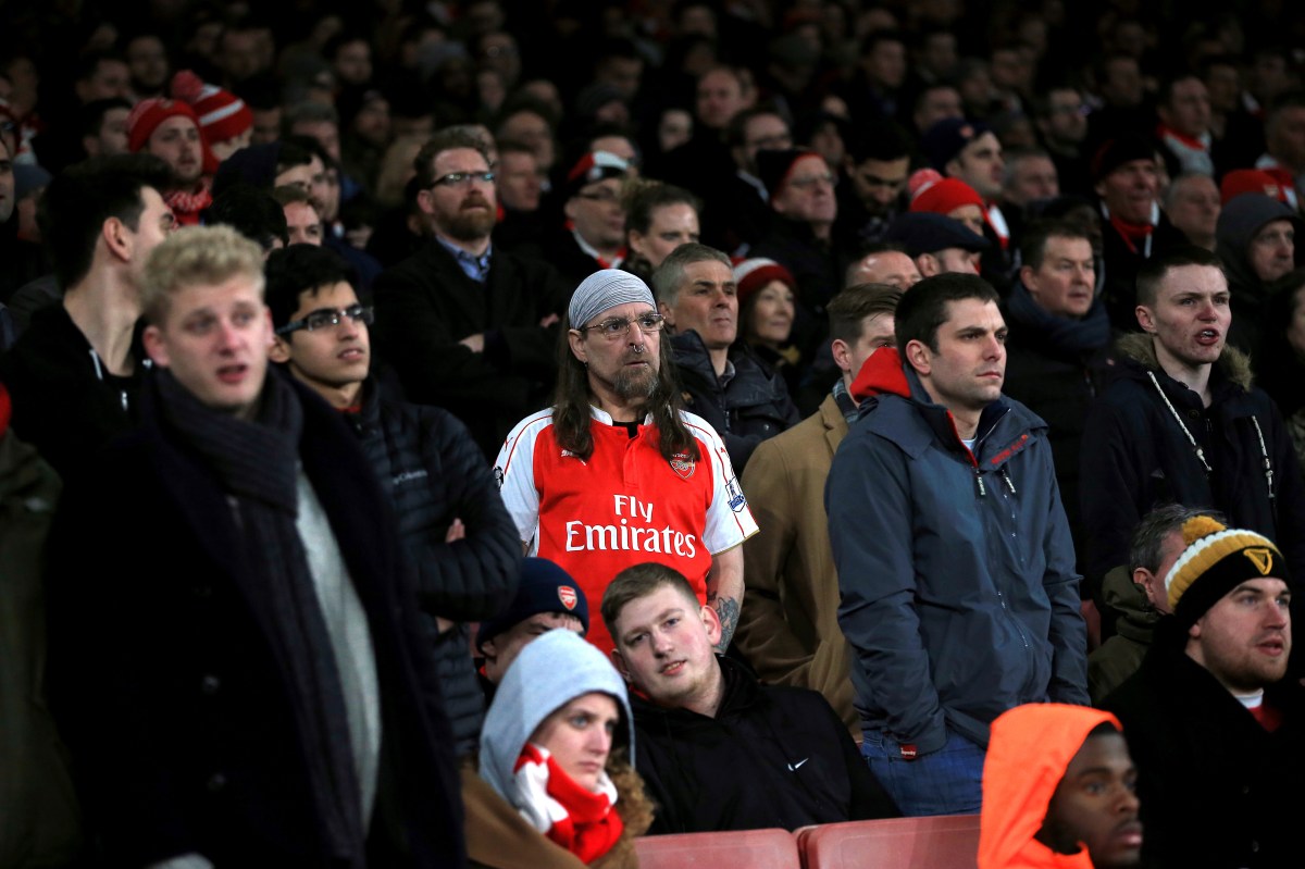 Arsenal fans appear dejected in the stands during the Barclays Premier League match at the Emirates Stadium, London.. Picture date: Wednesday March 2, 2016. See PA story SOCCER Arsenal. Photo credit should read: Nick Potts/PA Wire. RESTRICTIONS: EDITORIAL USE ONLY No use with unauthorised audio, video, data, fixture lists, club/league logos or "live" services. Online in-match use limited to 75 images, no video emulation. No use in betting, games or single club/league/player publications.