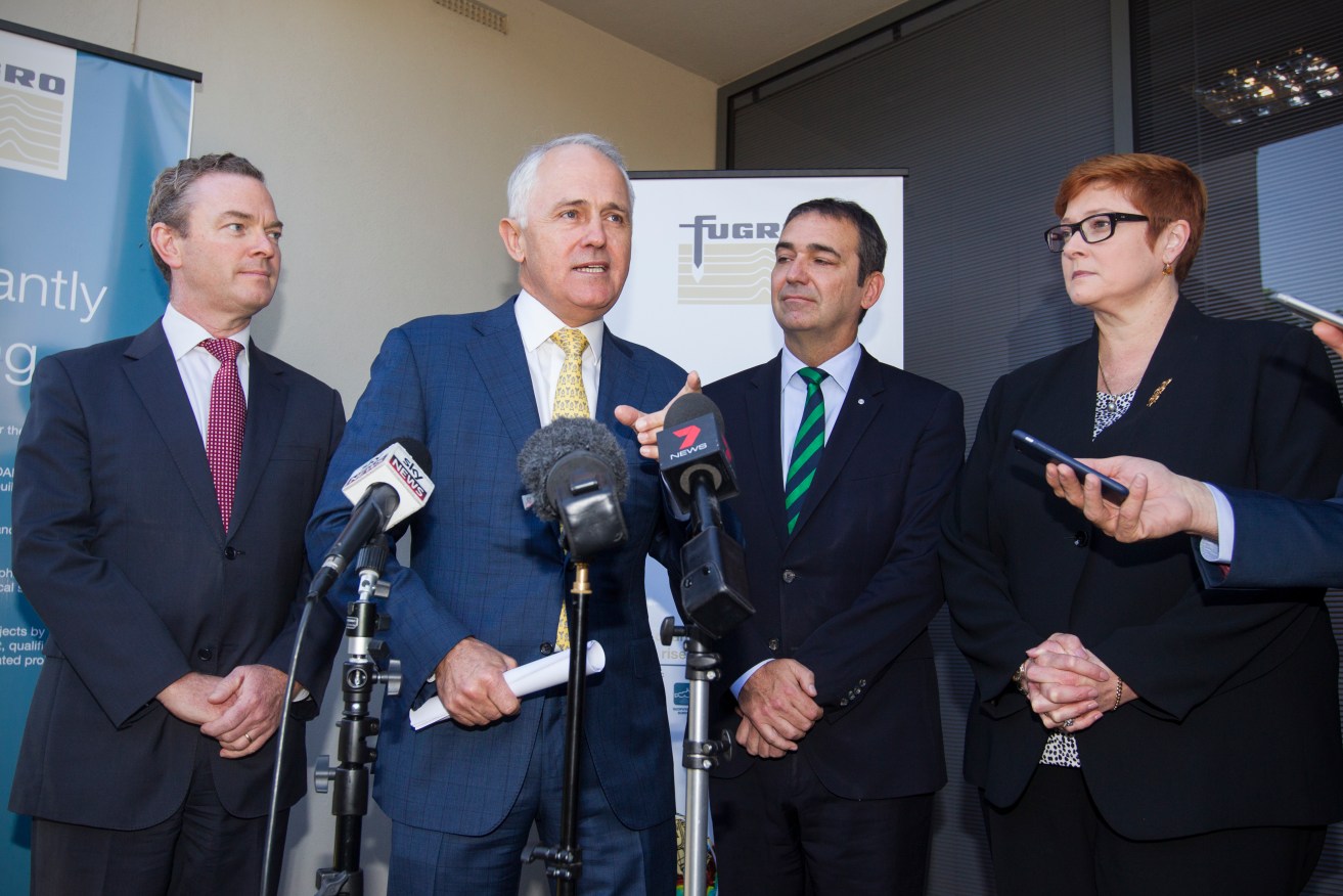Prime Minister Malcolm Turnbull in Adelaide today with Industry Minister Christopher Pyne (left), SA Liberal leader Steven Marshall and Defence Minister Marise Payne. Photo: AAP/Ben Macmahon