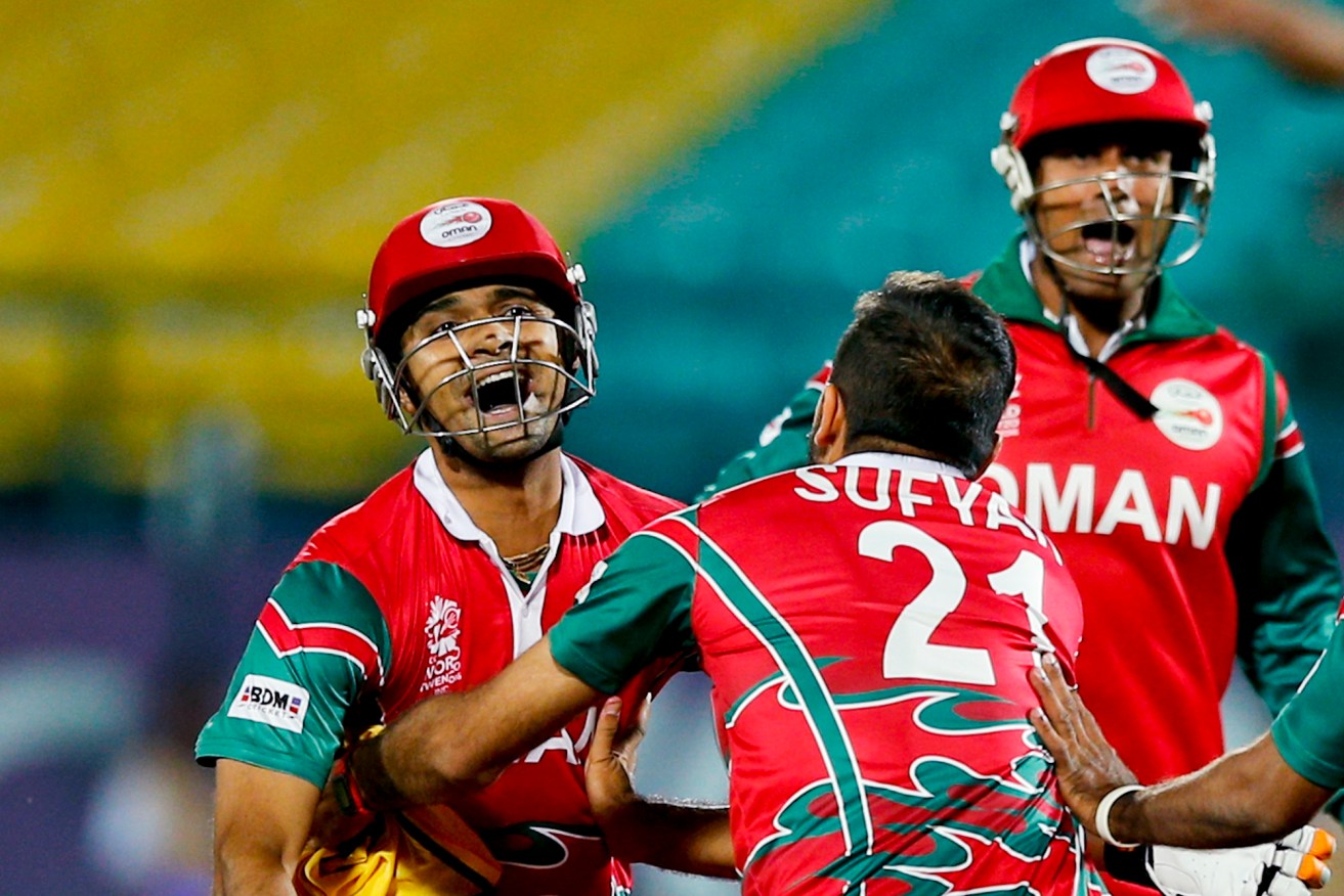 Wild celebrations as Oman beat Ireland in their first ICC World Twenty20 match. Photo: Tsering Topgyal, AP.