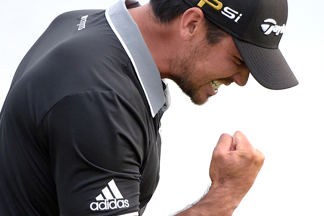 Jason Day celebrates after sinking a putt for par on the 18th green to win the Arnold Palmer Invitational golf tournament in Orlando. Photo: Phelan M. Ebenhack, AP.