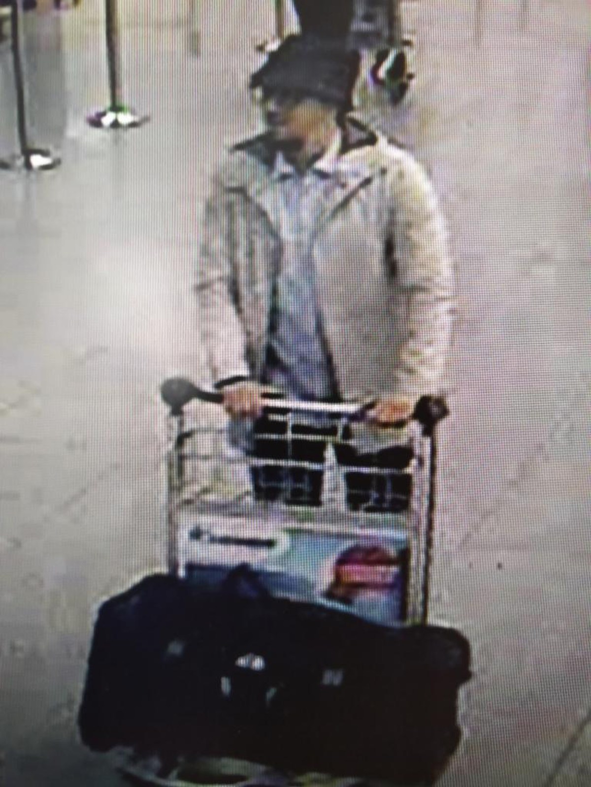 An image of a man who is suspected of taking part in the attacks at Belgium's Zaventem Airport and is being sought by police. Photo: Belgian Federal Police via AP