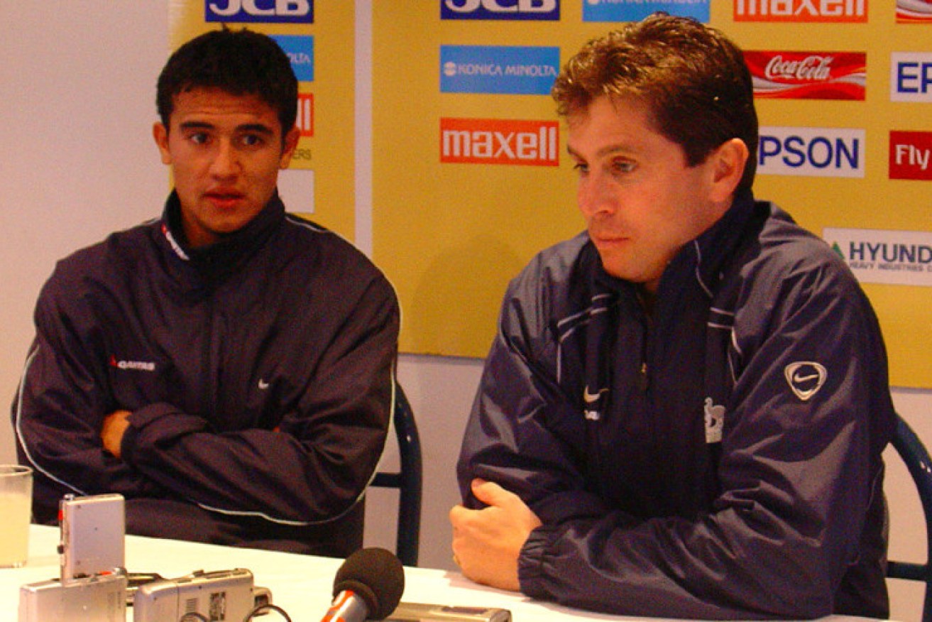 Then-rising star Tim Cahill and former Australian coach Frank Farina front the media during the World Cup qualification series held in Adelaide in 2004. Photo: Paul Marcuccitti.