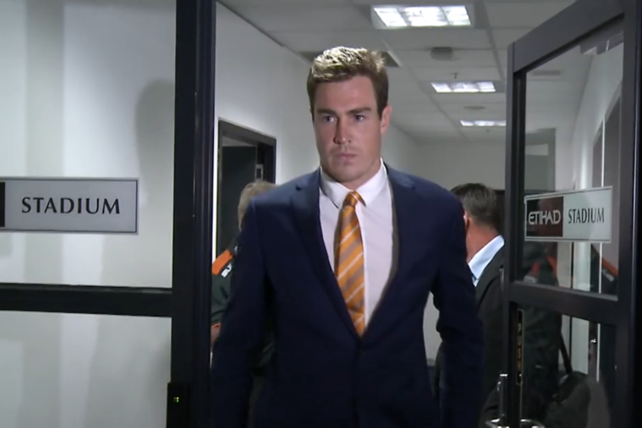 Cameron leaves the tribunal last night. Photo: AFL Video.