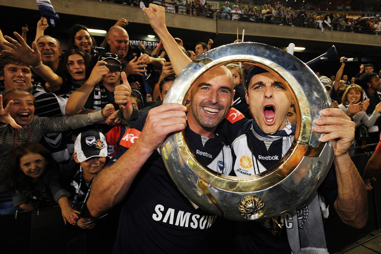 HAPPY MEMORIES: Melbourne Victory's Kevin Muscat celebrates with team-mate Tomislav Pondeljak after beating Adelaide United in the 2009 A-League final. God bless 'em! Photo: Joe Castro, AAP.