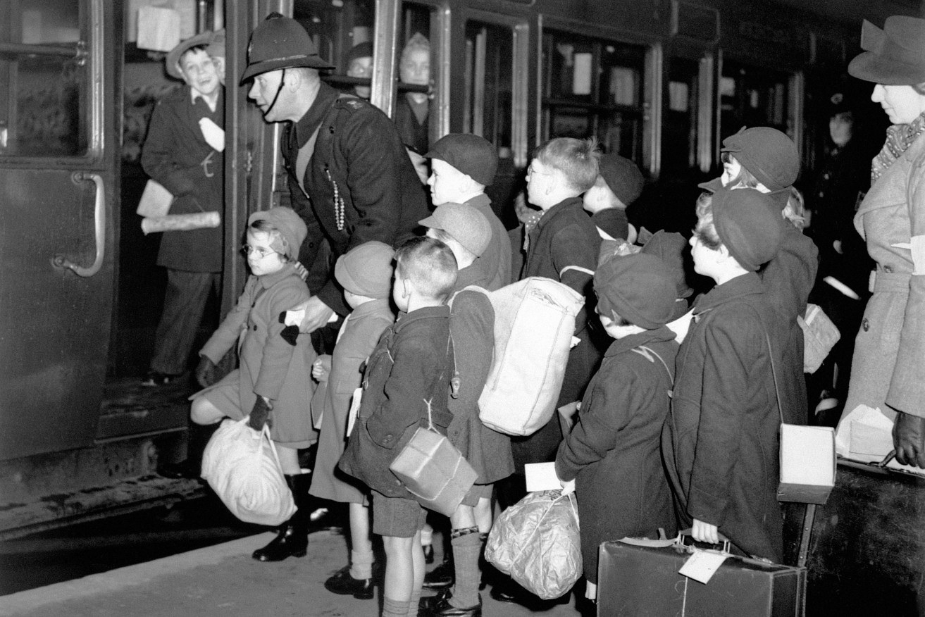 London schoolchildren set for evacuation to Devon during World War II.  The War Generation understands the importance of collectivity. Photo: PA Archive.