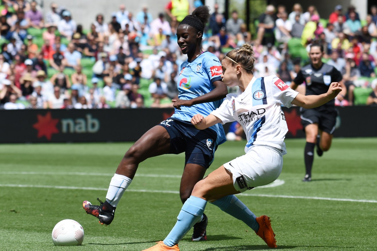 Princess Ibini-Isei of Sydney FC and Stephanie Catley of Melbourne City FC during January's W-League grand final. Photo: Tracey Nearmy, AAP.