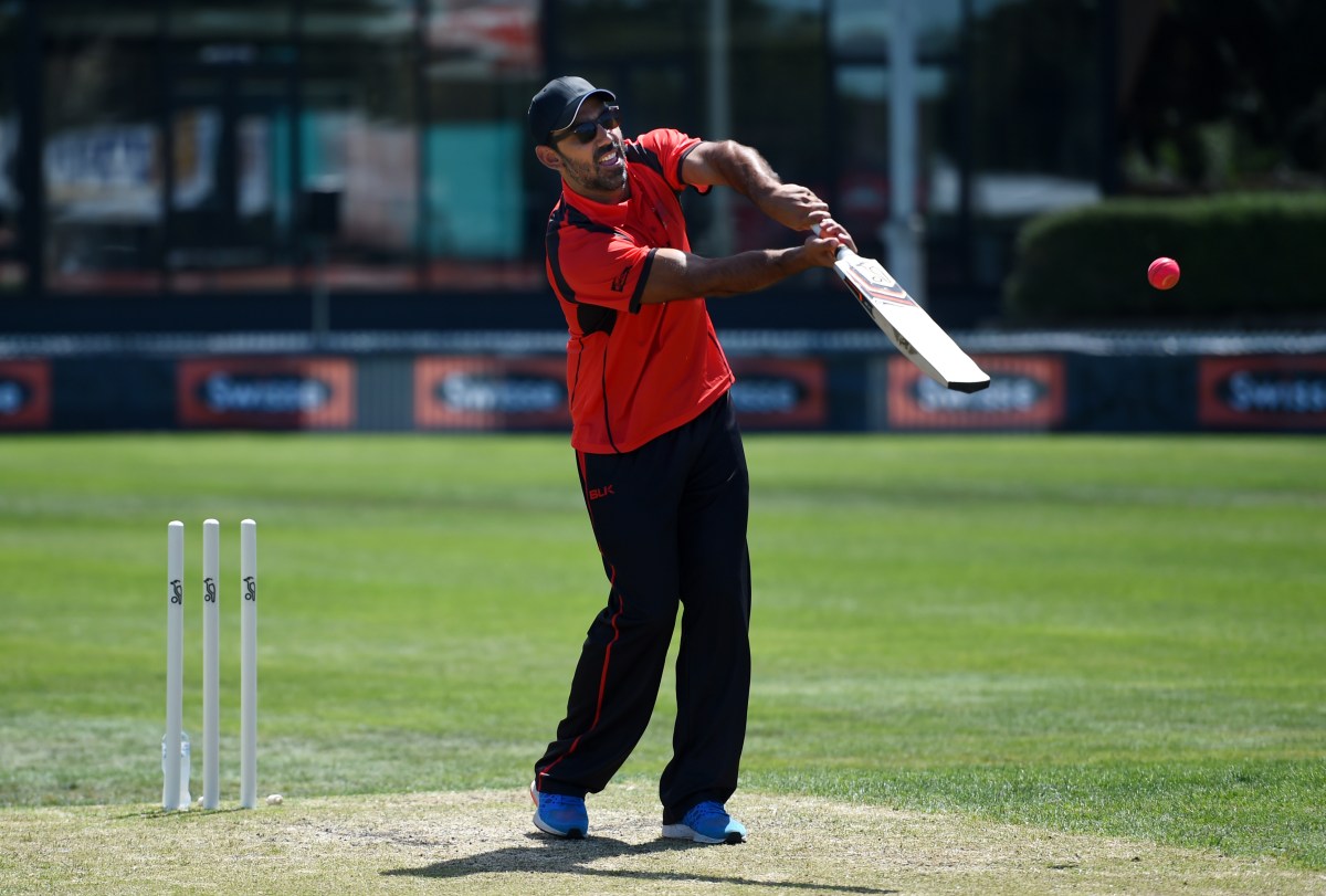 Footballer Adam Goodes warms up before the Celebrity 20 Twenty cricket match in honour of her son Luke at Northport Oval in Melbourne, Sunday, Feb. 21, 2016. The Medibank Celebrity 20 Twenty cricket match is the first big fundraising event for the Luke Batty Foundation and has been created in honour of her son who died playing the sport. (AAP Image/Tracey Nearmy) NO ARCHIVING