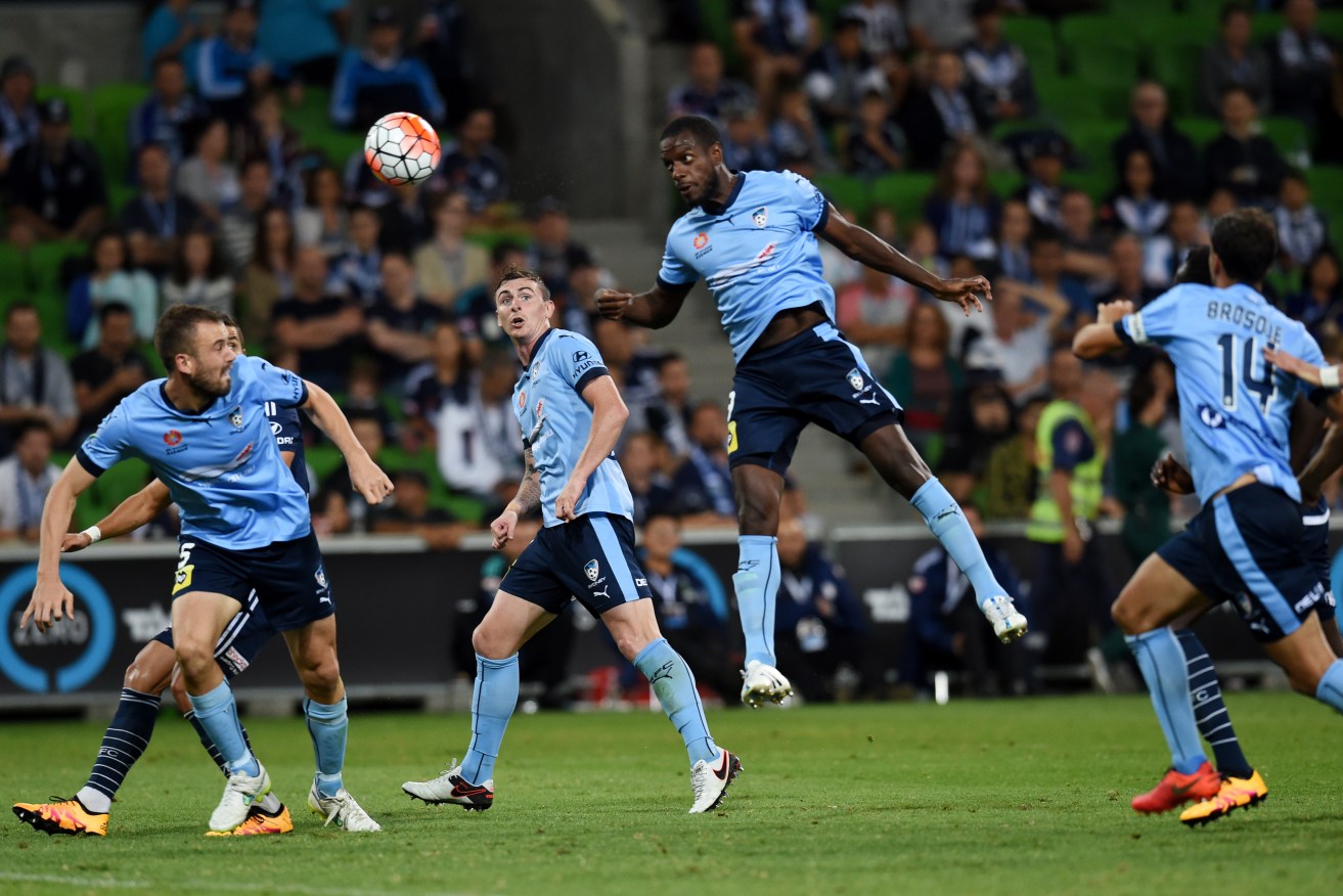 Jacques Faty tries for a goal during Sydney's Round 21 match against Melbourne Victory . Photo: Tracey Nearmy, AAP.