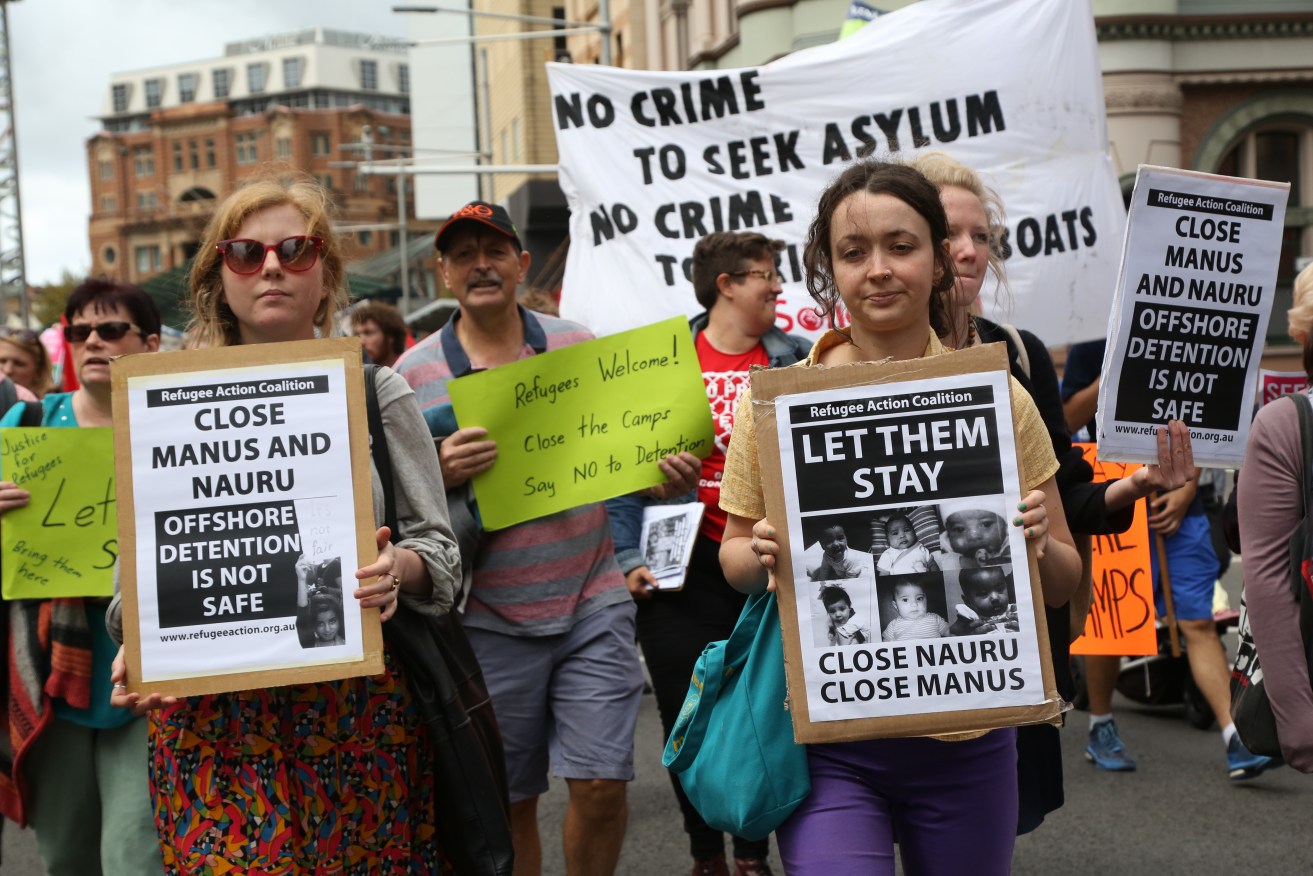Thousands of Australian take to the streets in Sydney to protest against the Government's asylum seeker policies.  Photo: Richard Milnes, NewZulu/AAP. 