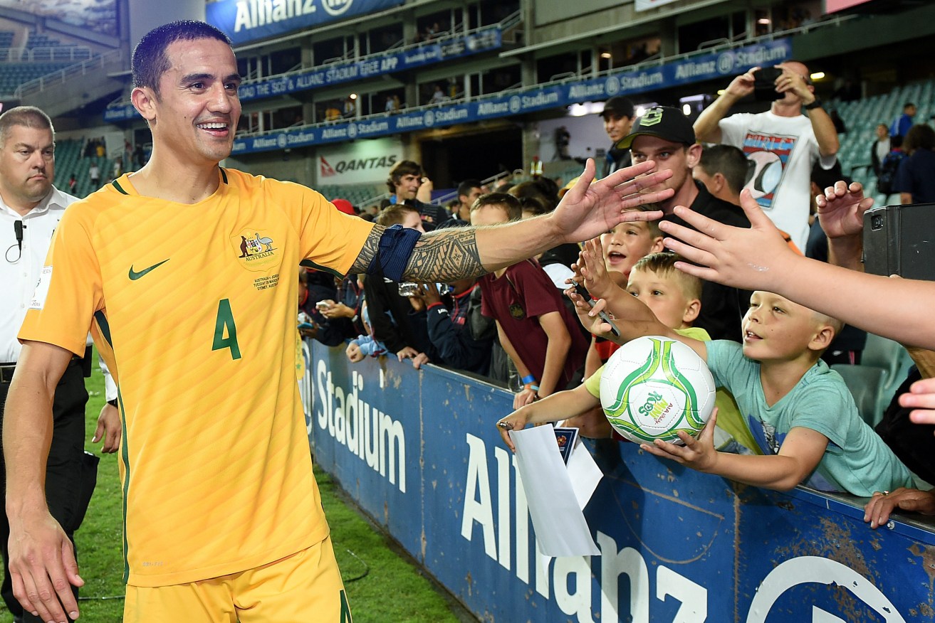 Tim Cahill greets supporters in Sydney. Photo: Dan Himbrechts, AAP.